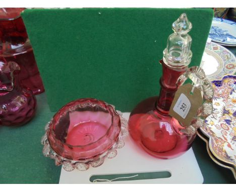 Early cranberry glass circular posy vase and a wine carafe in similar style