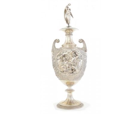 A VICTORIAN SILVER SHIELD SHAPED VASE AND COVER  finely chased in high relief with scenes of warriors reserved on a textured 