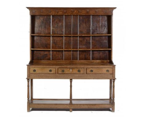 A GEORGE III OAK DRESSER, NORTH WALES, FIRST HALF 19TH C  with boarded rack, 202cm h; 41 x 168cm ++Of relatively light colour