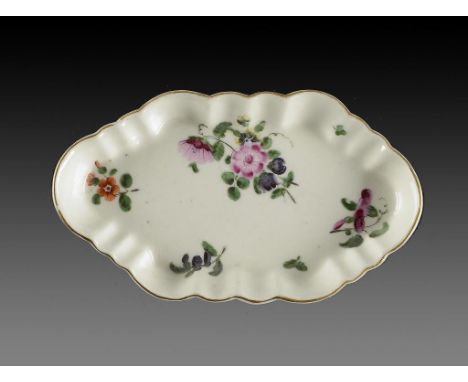 A WORCESTER POLYCHROME SPOON TRAY, C1785  enamelled with a loose bouquet and scattered flowers, 15cm w ++In fine condition no