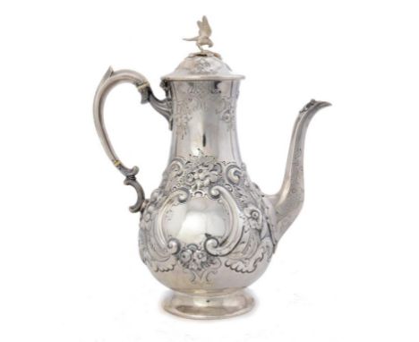 A VICTORIAN SILVER BALUSTER COFFEE POT  chased with flowers, 30cm h, by DJ & C Houle, London 1864, 28ozs ++In good condition 