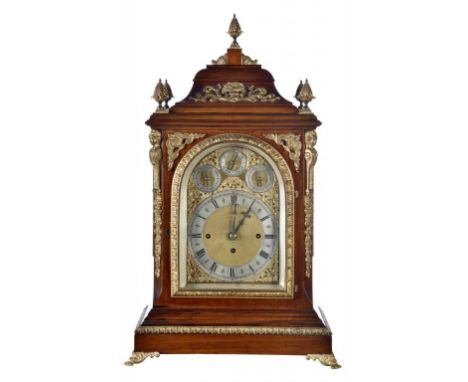 A VICTORIAN GILT BRASS MOUNTED MAHOGANY BRACKET CLOCK, C1900  the arched gilt brass dial with  matted centred, silvered chapt