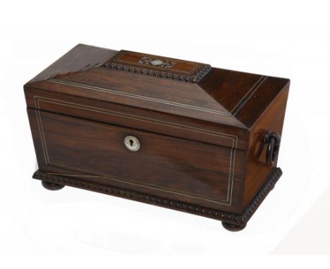 A VICTORIAN ROSEWOOD  AND MOTHER OF PEARL INLAID TEA CADDY OF SARCOPHAGUS SHAPE, C1850  with fitted interior, 34cm w ++In fin
