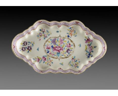 A WORCESTER POLYCHROME SPOON TRAY, C1785  enamelled with flowers in mauve diaper border, 15.5cm w ++In fine condition, no res