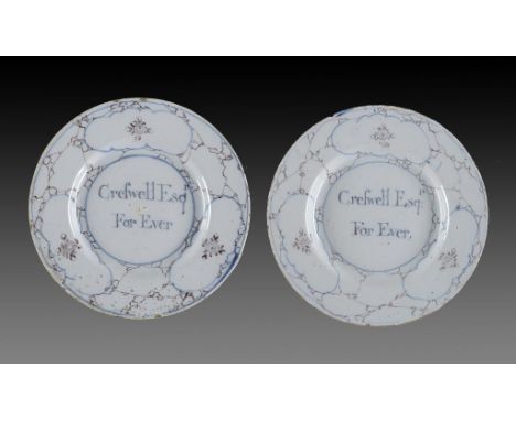 A PAIR OF BRISTOL DELFTWARE PLATES, C1750-60  in a slightly bluish glaze and inscrived in blue Crefwell Esqr For Ever, in a b
