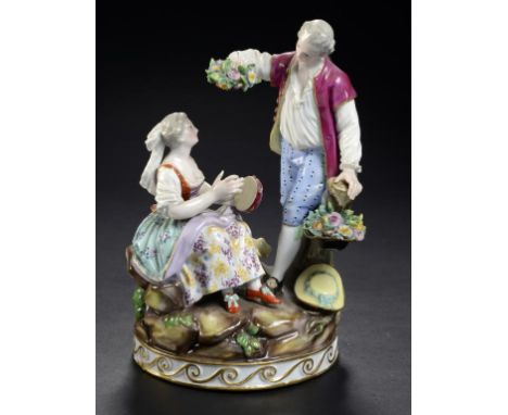A MEISSEN GROUP OF RUSTIC LOVERS, 19TH C  on gilt base, 18.5cm h, indistinct incised number, crossed swords ++Some typical li