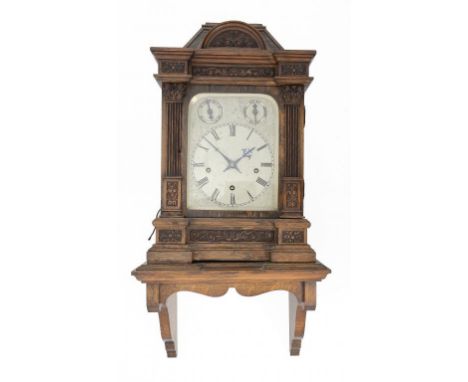 A GERMAN OAK BRACKET CLOCK, C1900  with enamelled dial inscribed ROBERT ROSKELL LIVERPOOL, having spring driven movement with