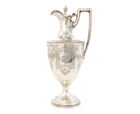 A VICTORIAN SILVER SHIELD SHAPED CLARET JUG with beaded rims, engraved with  armorials, 32cm h, by Henry Wilkinson & Co, Lond