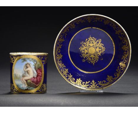 A SÈVRES STYLE COFFEE CAN AND SAUCER, LATE 19TH C  the coffee can painted with an oval medallion of a bather, saucer 13.5cm d