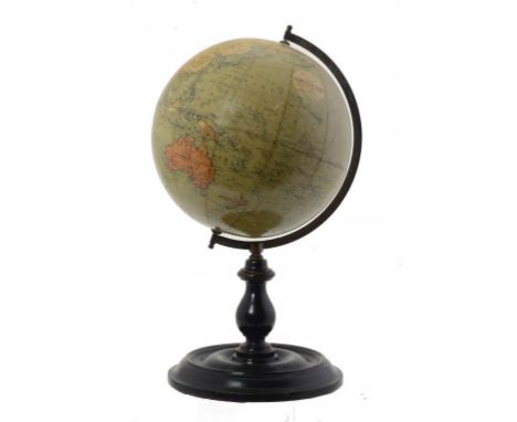 A 9 INCH TERRESTRIAL GLOBE PUBLISHED BY GEORGE PHILIP & SON LTD, 32 FLEET ST, LATE 19TH C  mounted in a brass meridian half c