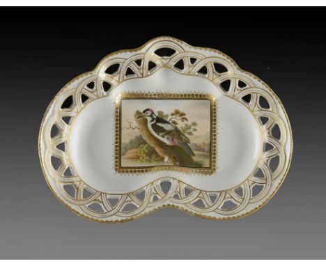 A CHAMBERLAIN WORCESTER PIERCED DESSERT DISH, C1810  painted with a rectangular panel of a woodpecker, 25cm w, painted title 