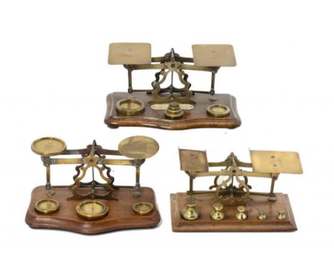 THREE VICTORIAN BRASS ROBERVAL LETTER SCALES, LATE 19TH/EARLY 20TH C  one by T J and J Smith on walnut or oak base with brass