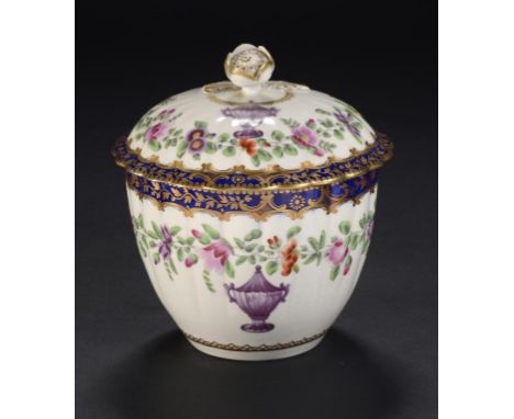 A WORCESTER BLUE BORDERED SUCRIER AND COVER, C1780-85  enamelled with flowers and a puce urn, 12cm h, open crescent ++Sucrier