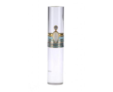 A WENDY RAMSHAW RING TOWER  with pear shaped cabochon moonstone set 18ct gold ring between translucent enamel bands, on acryl