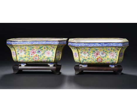 A PAIR OF CANTON  PAINTED ENAMEL  YELLOW GROUND JARDINIERES, QING DYNASTY, QIANLONG MARK, 19TH/20TH C  25cm w, wood stands ++