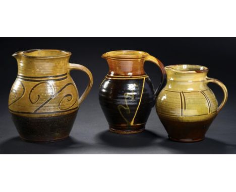 SIDNEY TUSTIN (1913-2005) A SLIPWARE JUG, C1970 20cm h, impressed potter's and Winchcombe Pottery seals, another Winchcombe P