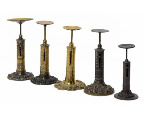 FIVE ENGLISH BRASS PILLAR SHAPED LETTER SCALES ON DECORATIVE FOOT, C1840-60  one foot of iron, the makers comprising R Winfie