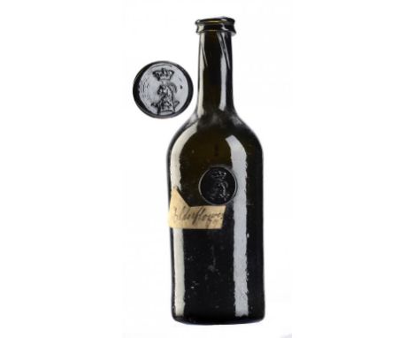 AN ENGLISH GLASS HALF SIZE CYLINDER  BOTTLE, BAGOT SEAL, C1760-1810  23cm h, affixed old handwritten label Elderflower [18]79
