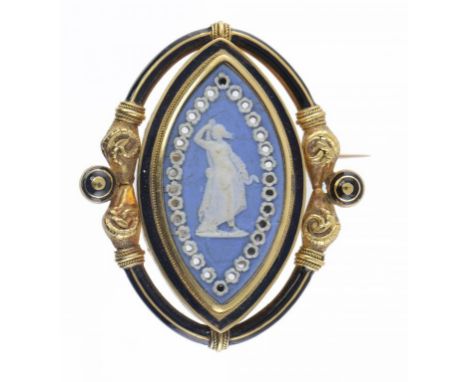 A VICTORIAN GOLD AND BLACK ENAMEL NAVETTE SHAPED BROOCH SET WITH A PIERCED WEDGWOOD BLUE JASPER CAMEO, C1870-5  50mm, impress