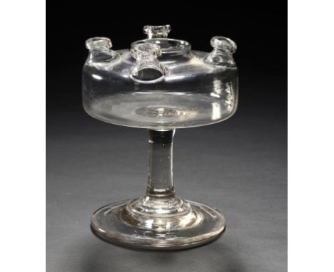 A GLASS OIL LAMP, EARLY 19TH C   with four nozzles and solid stem, 18cm h ++In fine condition