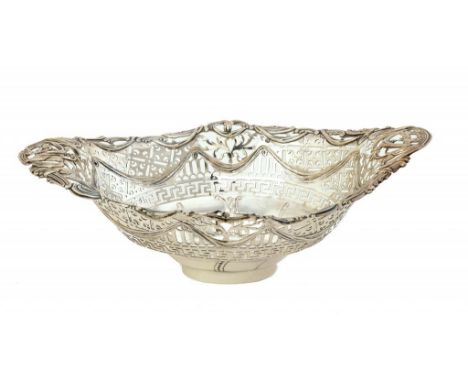 AN IRISH GEORGE III PIERCED SILVER DISH FROM AN EPERGNE  crested, 33cm w, maker's mark indistinct, Dublin c1780, 12ozs ++Tiny