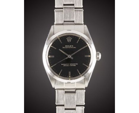 A RARE GENTLEMAN'S STAINLESS STEEL ROLEX OYSTER PERPETUAL BRACELET WATCHCIRCA 1967, REF. 1002 WITH GLOSS BLACK GILT DIALMovem