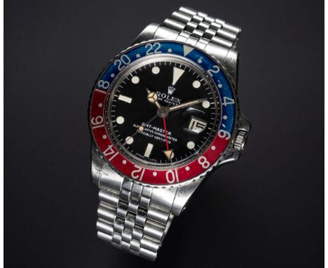 A GENTLEMAN'S STAINLESS STEEL ROLEX OYSTER PERPETUAL GMT MASTER BRACELET WATCHCIRCA 1969, REF. 1675 WITH "LONG E" MATT DIAL M