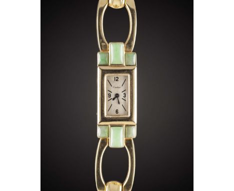 A RARE LADIES 14K SOLID GOLD & JADE CARTIER BRACELET WATCHCIRCA 1940, MADE FOR THE AMERICAN MARKET Movement: 16J, manual back