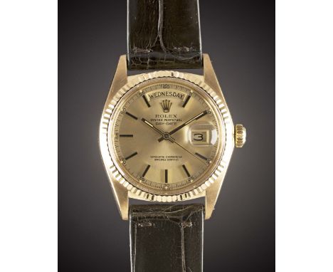 A GENTLEMAN'S 18K SOLID GOLD ROLEX OYSTER PERPETUAL DAY DATE WRIST WATCHCIRCA 1976, REF. 1803 CHAMPAGNE DIAL WITH ARABIC NUME