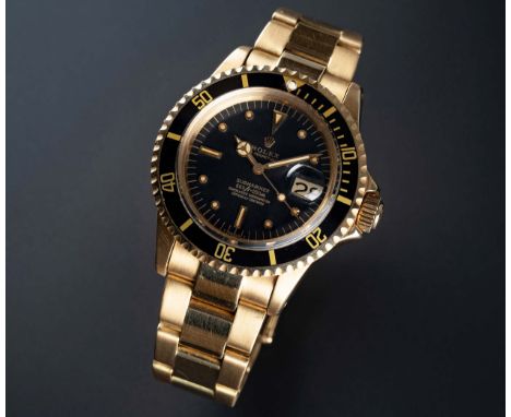 A FINE & RARE GENTLEMAN'S 18K SOLID YELLOW GOLD ROLEX OYSTER PERPETUAL DATE SUBMARINER BRACELET WATCHCIRCA 1973, REF. 1680 WI