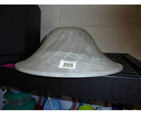 A glass uplighter lamp shade.
