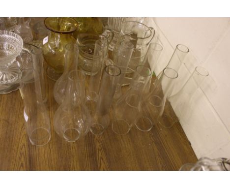 A quantity of glass oil lamp funnels 