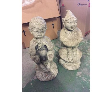 Two garden ornaments, one of an elf sitting another of a Pan sitting playing a flute