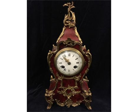 A Maple and Co Mantle clock with Ormolu decoration