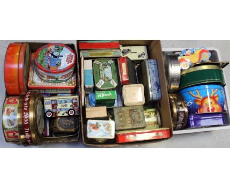 A quantity of vintage tins to include tea caddies, biscuit tins, Cadbury's chocolate tins, Christmas tins, royal commemorativ