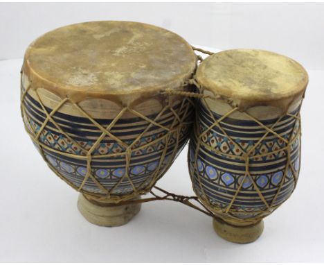 A set of ceramic Indian tablas, width approx 38cm.