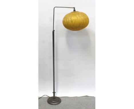 A 1920s chrome swing-arm standard lamp with later 1970s woven shade, height approx 150cm.