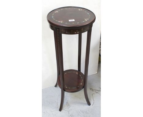 An Edward VII circular mahogany jardinière stand with painted floral decoration to the top and swags and harebells to the fri
