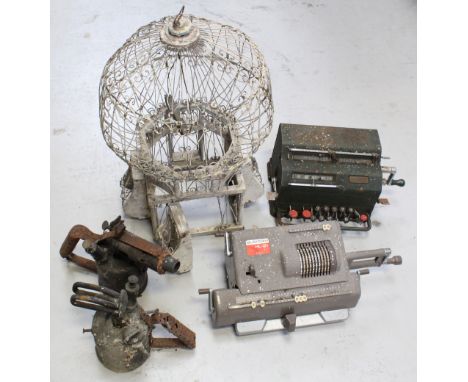 A mixed lot to include a Busicom HL21 adding machine, a Facit example, two vintage blow lamps and a 19th century wirework bir