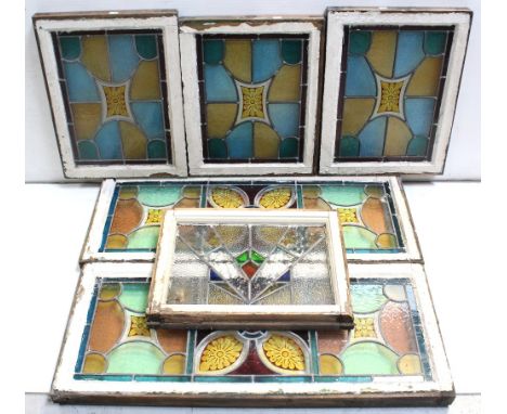 A group of vintage stained glass windows to include two large rectangular matching panels, approx height 100cm, three smaller