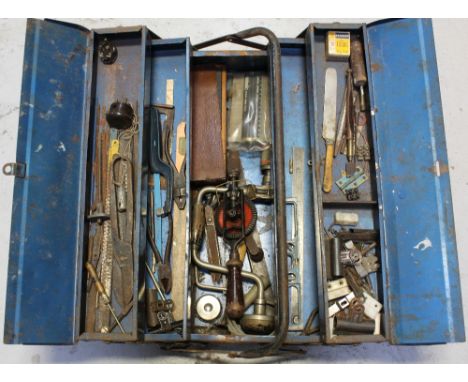 A vintage metal expanding toolbox containing a quantity of vintage tools to include cutters, screwdrivers, drills etc.