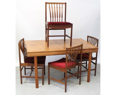 A teak extending Nathan leaf table on turned legs, width 89cm and four matching teak dining chairs with shaped stick backs (5