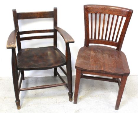 Two c1920s wooden seat chairs, one oak with flared stick back,  the other in beech with turned legs united by a peripheral st