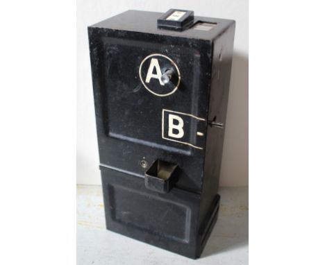 A vintage black coin box for commercial telephone kiosk. CONDITION REPORT With internal mechanism, lacking key.