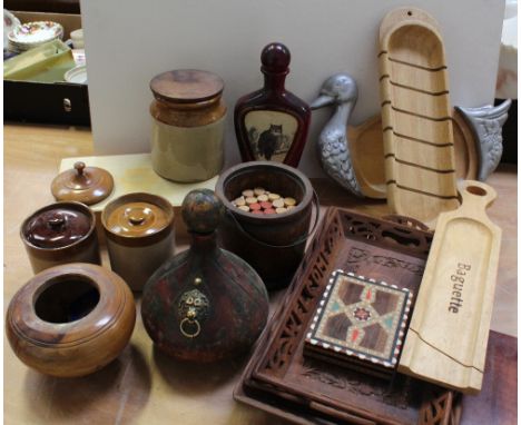 A quantity of treen items to include bowls, inlaid boxes, stoneware ceramic storage jars, a vintage treen biscuit barrel etc.