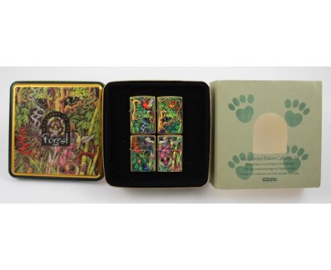 A Zippo 1995 limited edition collectors' set of 'Mysteries of the Forest' lighters, four lighters contained in a collectors' 