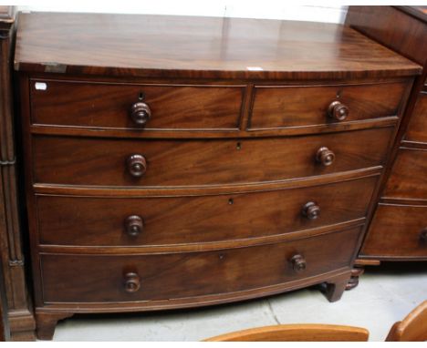 A George III Mahogany bow-front chest of two-over-three drawers on square bracket feet, height 92.5cm.