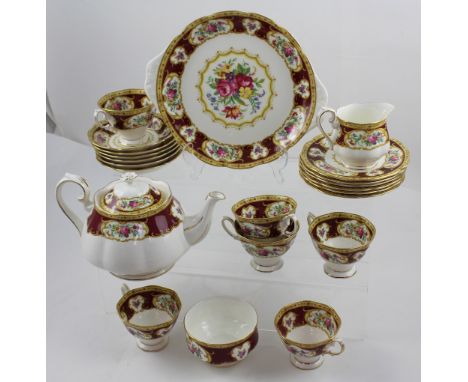 A Royal Albert 'Lady Hamilton' part tea service comprising six cups and saucers, plates, sandwich plates, teapot, milk jug an