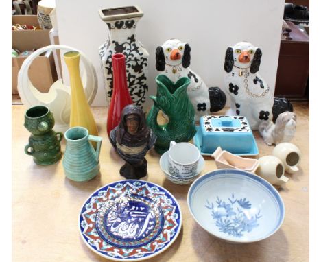 A collection of assorted ceramics to include two modern Staffordshire chimney dogs, a Beswick hoop vase, an Edwardian ceramic