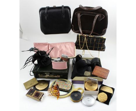 A small vintage vanity case, two satin evening purses, a vintage brown suede handbag and a vintage black leather handbag, a f